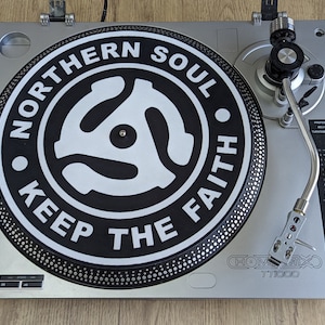 A  top down shot of the northern soul keep the faith Adapter slip mat 12" from modmat