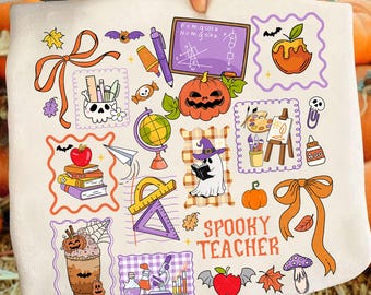 May include: A white fabric with colorful Halloween-themed illustrations. The design includes pumpkins, ghosts, apples, books, and the text "Spooky Teacher." The artwork is framed with purple borders and orange accents.