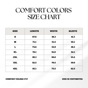 Puede incluir: Una tabla de tallas para ropa Comfort Colors, con medidas en cent&iacute;metros. La tabla incluye tallas de la S a la 4XL, con medidas de largo, ancho y manga. El texto "COMFORT COLORS SIZE CHART" est&aacute; en la parte superior.