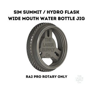 May include: A gray water bottle jig with the text "SIM SUMMIT / HYDRO FLASK WIDE MOUTH WATER BOTTLE JIG" and "RA2 PRO ROTARY ONLY". The jig has a textured outer ring and a central design with the text "THE LASER SUPPLY Co."