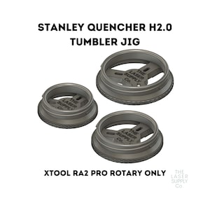 Może przedstawiać: Trzy szare plastikowe pierścienie jig do kubka Stanley Quencher H2.0. Pierścienie są oznaczone "The Laser Supply Co.". Tekst "XTOOL RA2 PRO ROTARY ONLY" jest wydrukowany pod pierścieniami.