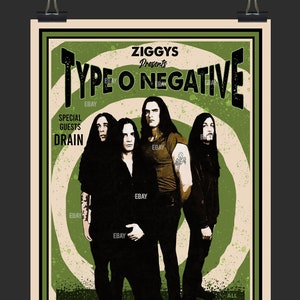 May include: A vintage concert poster advertising a Type O Negative concert with special guests Drain. The poster is green and black with a white background and features a band photo of the four members. The concert is scheduled for Saturday, March 15, 1997 at 433 Baity St W-S, North Carolina. Doors open at 9 PM and the show starts at 10 PM. Advance tickets are $12.00 and day of show tickets are $15.00.