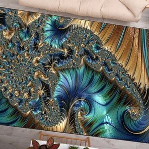 May include: A rectangular area rug with a swirling, abstract design in shades of teal, gold, and navy blue. The rug's pattern resembles a fractal or a stylized feather, creating a visually dynamic and artistic statement. The rug is placed on a light wood floor.