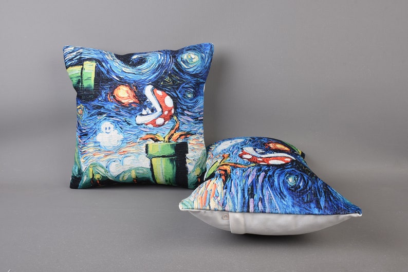 May include: Two decorative throw pillows with a blue, green, and red print inspired by the famous Starry Night painting by Vincent van Gogh. The print features a video game character and a pipe.