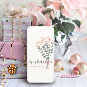 May include: A white phone case with a floral design and the text "Happy Birthday! I wish you all the very best!"