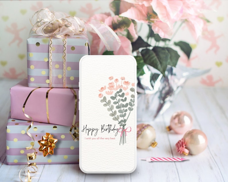 May include: A white phone case with a floral design and the text "Happy Birthday! I wish you all the very best!"