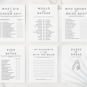 May include: Six white cards with black text for a bridal shower game. The cards include "What Did the Groom Say?", "Would She Rather", "Who Knows the Bride Best?", "Ever or Never", "My Favourite Memory with the Bride", and "Guess the Dress".