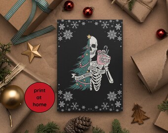 May include: A black canvas print featuring a skeleton holding a festive drink and a Christmas tree. The text reads "Sorta Merry, Sorta Scary." The print is surrounded by snowflakes and the words "print at home" are in a red circle.