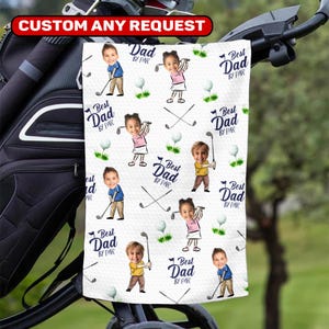 May include: White golf towel with a repeating pattern of cartoon children playing golf, golf balls, and crossed golf clubs. The text "Best Dad by Par" is also featured. The top of the towel has the text "CUSTOM ANY REQUEST".