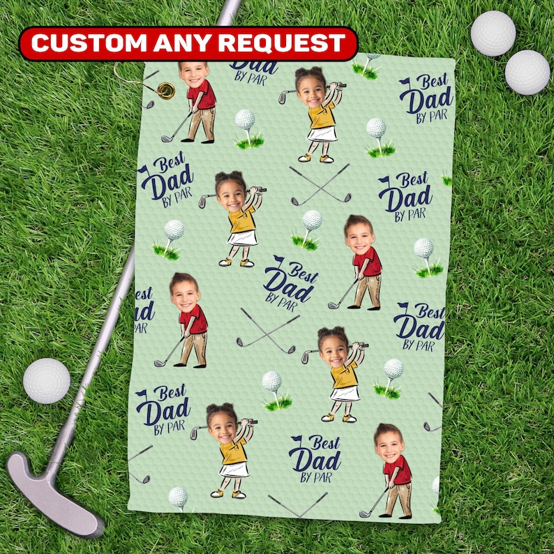 May include: A light green golf towel with a repeating pattern of cartoon children playing golf, golf balls, and crossed golf clubs. The text "Best Dad By Par" and "Custom Any Request" are also visible.