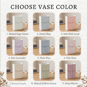 May include: A grid of nine rectangular vases, each featuring vertical stripes and the text 'Amelia + Harry est. 2026'. The vases are displayed in various colors: muted sage green, dusty blue, soft pink coral, pale lavender, slate blue, pale rose, pastel peach, muted willow green, and deep mauve.