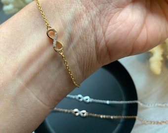 NataschaWoge® Armkettchen Gold Unendlichkeit Strass Infinity minimalistich Armband zierliches kleines Geschenk für Sie Schmuck Goldschmuck