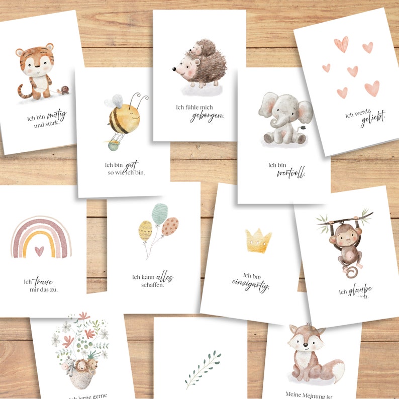 Puede incluir: Conjunto de 10 tarjetas imprimibles con ilustraciones de animales en acuarela y citas inspiradoras en alem&aacute;n. Las tarjetas presentan un tigre, una abeja, un erizo, un elefante, un arco&iacute;ris, globos, una corona, un mono, un zorro y una rama con hojas. Las citas incluyen "Ich bin mutig und stark", "Ich bin gut so wie ich bin", "Ich f&uuml;hle mich geborgen", "Ich bin wertvoll", "Ich werde geliebt", "Ich traue mir das zu", "Ich kann alles schaffen", "Ich bin einzigartig", "Ich glaube ich" y "Meine Meinung ist".