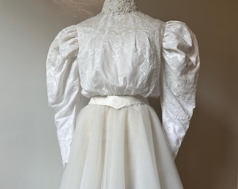 Modern Victorian Chic And Easy Bridal Dress. Antique Shadow Work Embroidery Mutton Sleeves, 8 Layers  Tulle Skirt.