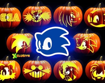 May include: A collection of ten orange pumpkins carved with various Sonic the Hedgehog character designs and the Sega logo. A large blue Sonic head silhouette is centered in the middle. The carvings glow with a bright yellow light against a black background.