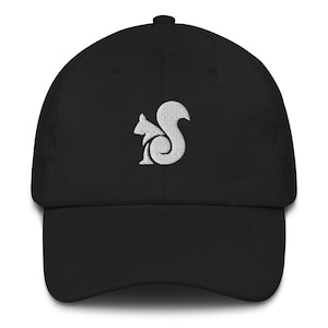 May include: A black baseball cap with a white embroidered squirrel design.