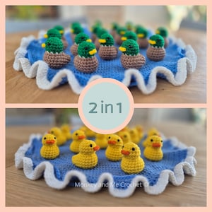 May include: Two sets of crocheted ducklings on a blue cloth with a white scalloped edge. The top set features brown and green ducks with yellow beaks. The bottom set shows yellow ducklings with orange beaks. The image includes the text "2 in 1".