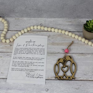 Amour et partenariat - Pendentif pingouin