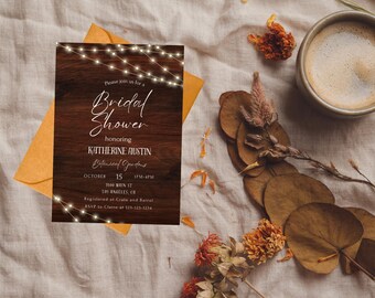 May include: A bridal shower invitation with a wooden background and string lights. The invitation includes the text "Bridal Shower" and details for Katherine Austin's event at the Botanical Gardens on October 15th. An envelope and a cup of coffee are also in the image.