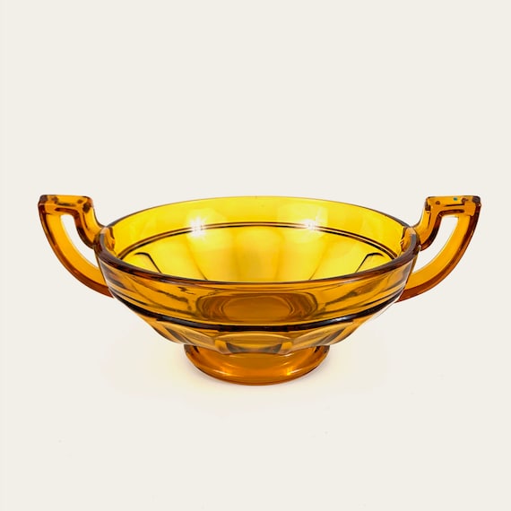 Large yellow glass cup with handles