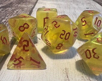 Sparkly Yellow Dice Set with Red Numbers - Tabletop RPG DnD Dice