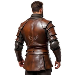 May include: A brown leather armour set featuring shoulder and arm protection, a belted waist, and a pleated lower section. The armour has a dark brown colour and is worn over a black garment. The Leather Craftery logo is visible on the back.
