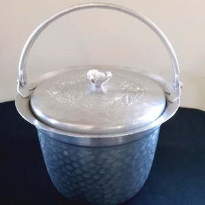 1940's Everlast Ice Preserver. The Outside Is Everlast Hand Crafted Hammered Aluminum With A Pyrex Glass Insert And Insulated Plastic Ring