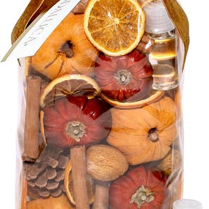 May include: A clear plastic bag filled with potpourri containing dried orange slices, small red and orange pumpkins, cinnamon sticks, pinecones, and walnuts, accompanied by a small glass bottle of scented oil and a white tag labeled Andaluca.