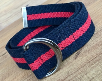 May include: A black and red striped fabric belt with a silver metal buckle and a silver metal D-ring.