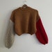 see more listings in the Sweater & Cardigan  section