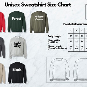 a long sleeved shirt with different font and colors