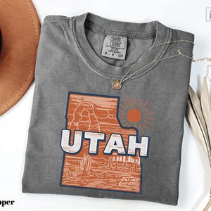 a t - shirt with the state of utah on it