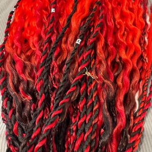 Black to red ombré thin double ended wavy dreads and twists