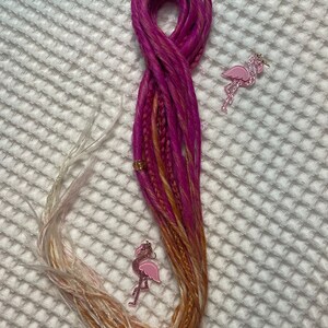 Pink to orange to blonde  thin synthetic dreads