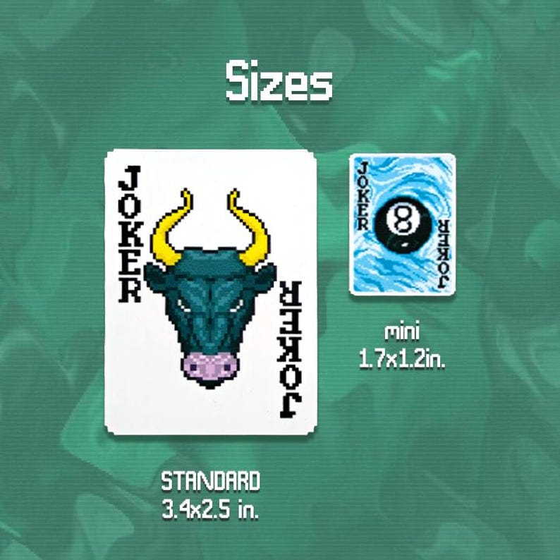 May include: Two Joker playing cards, one standard size 3.4 x 2.5 inches, and one mini size 1.7 x 1.2 inches. The standard card features a bull's head with yellow horns. The mini card shows a blue 8-ball.