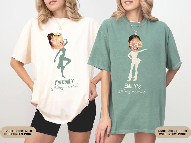 May include: Two white t-shirts with a green print. One shirt says "I'm Emily getting married" and features a silhouette of a woman with sunglasses. The other shirt says "Emily's getting married" and features a silhouette of a woman with sunglasses.
