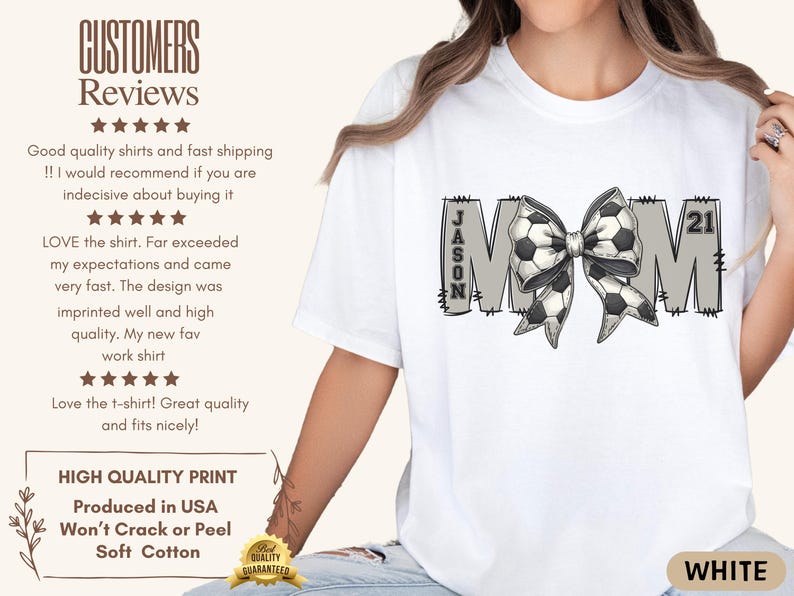 May include: White t-shirt with a gray "MOM" design featuring a soccer ball bow and the name "JASON" and the number "21".