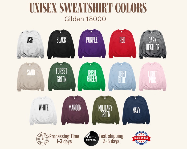 May include: A chart showing 14 different color options for unisex Gildan 18000 sweatshirts. The colors include ash, black, purple, red, dark heather, sand, forest green, Irish green, light blue, light pink, white, maroon, military green, and navy.