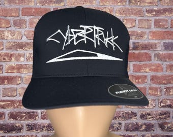 Cybertruck graffiti/silhouette  hat. (Delta Flexfit)