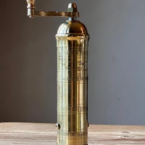 close up of pepper mill brass