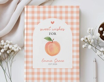 May include: A peach-colored and white gingham pattern journal with the text "sweet wishes for" and a watercolor peach illustration. The journal is personalized with the name "Emma Grace" and the year "EST 2026".