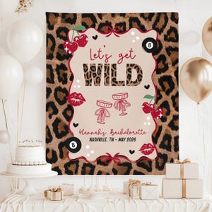 May include: A leopard print backdrop with the text "Let's get WILD" in a decorative frame. The design includes cherries, lips, and cocktail glasses. The text "Hannah's Bachelorette, Nashville, TN - May 2026" is also present.