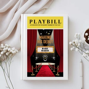 May include: A white playbill book with a yellow banner that reads "PLAYBILL" and "AUTOGRAPHS FOR THE NEWEST MEMBER OF THE CAST". The cover features a red carpet, red curtains, and the text "MAKING HIS DEBUT" and "BABY BAKER".