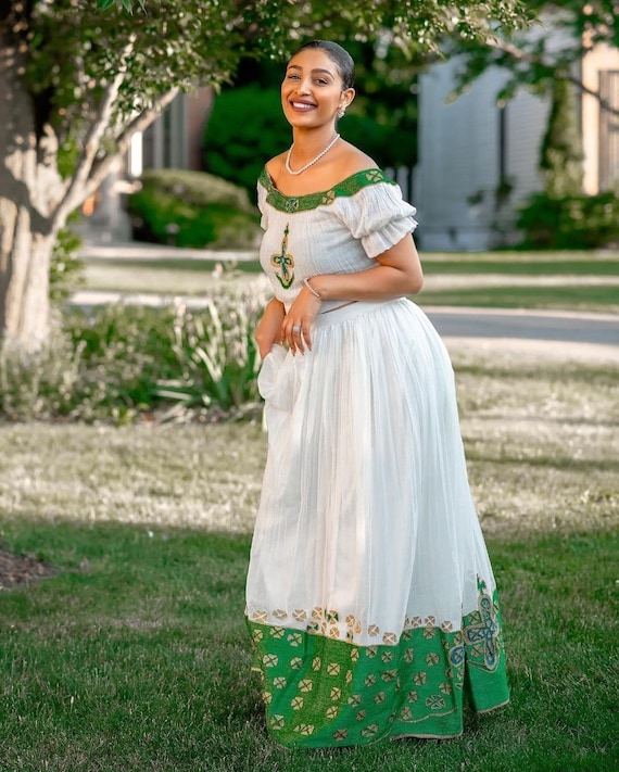 green emerald velvet dress Yordi | Habesha Zurya Dress