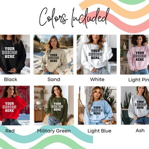 K&ouml;nnte beinhalten: Ein Mockup eines Sweatshirts in zehn verschiedenen Farben: Schwarz, Sand, Wei&szlig;, Hellrosa, Rot, Milit&auml;rgr&uuml;n, Hellblau, Aschgrau, Marineblau und Hellgrau meliert. Das Sweatshirt hat den Text "Your Design Here" auf der Vorderseite gedruckt.