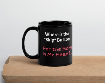 ¿Dónde está el botón Saltar de la canción en mi cabeza? Taza negra brillante