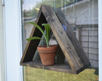 hanging shelf , suction cup shelf , plant hanger