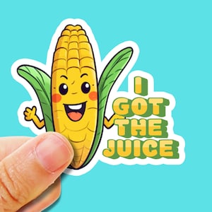 Puede incluir: Un maíz de dibujos animados con una cara sonriente y el texto "I GOT THE JUICE" en letras verdes.