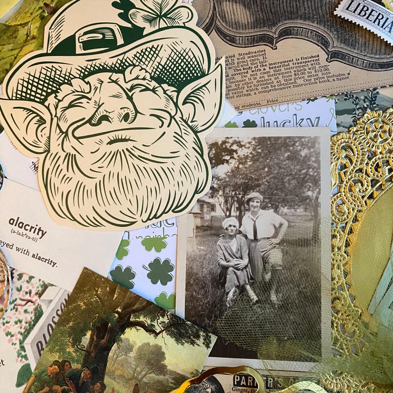 May include: A vintage postcard featuring a black and white photo of two women standing in a grassy field. The women are wearing hats and dresses. The postcard is surrounded by other vintage ephemera, including a green leprechaun illustration, a clover-themed paper, and a gold lace doily.