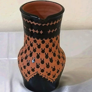 Clay jar of Moroccan tradition, decorated with Amazigh and tar motifs from Moroccan Pottery